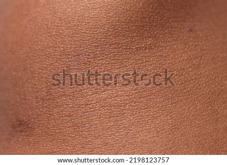 Human skin texture background,brown skin Royalty-Free Stock Photo #2198123757