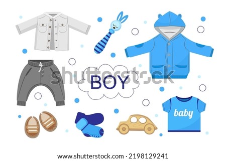 Set of baby clothes and accessories for boy on white background