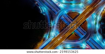 Expressway top view, Road traffic an important infrastructure, car traffic transportation above intersection road in city night, aerial view cityscape of advanced innovation, financial technology	 Royalty-Free Stock Photo #2198153625