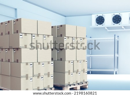 Refrigeration chamber for food storage. Loading a cold warehouse with boxes on wooden pallets.