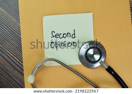 Concept of Second Opinion write on sticky notes isolated on Wooden Table. Royalty-Free Stock Photo #2198222967