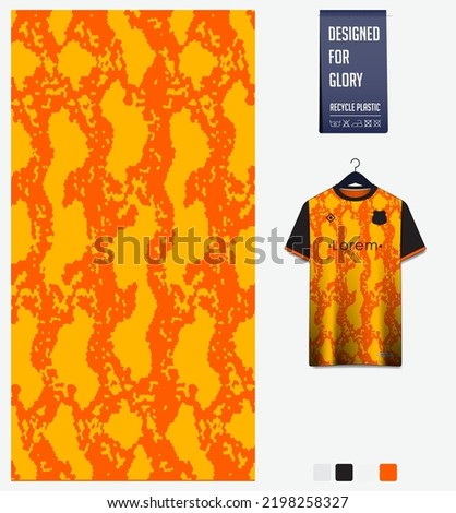 Soccer jersey pattern design. Snake pattern on dark orange background for soccer kit, football kit, bicycle, e-sport, basketball, t-shirt mockup template. Fabric pattern. Abstract background. Vector.