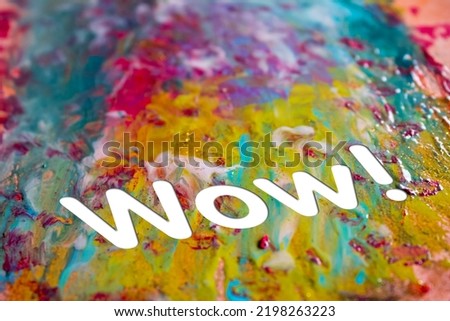 Abstract Natural Luxury art, fluid painting with Wow text, alcohol ink technique. Image incorporates the swirls of marble granite.