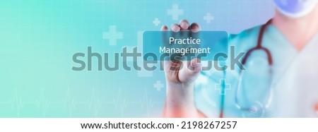 Practice Management. Doctor holds virtual card in hand. Medicine digital Royalty-Free Stock Photo #2198267257