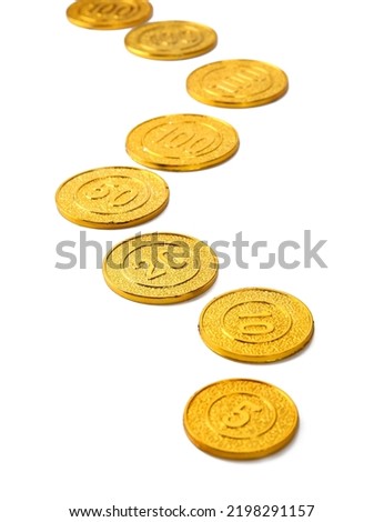 gold coins making curved path