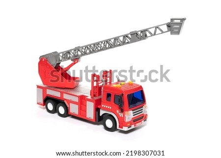 Little model fire brigade car isolated on white background. . High quality photo