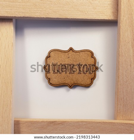 I love you written on wooden surface. wooden concept