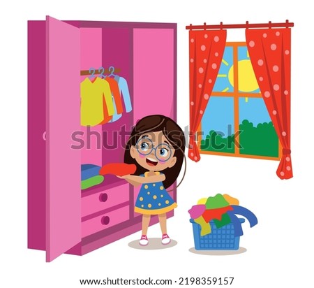 cute little girl tidying her room straightening her clothes