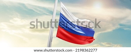 Russia national flag waving in beautiful sky.