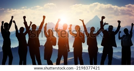 People rejoicing in front of nature. Business and success. Royalty-Free Stock Photo #2198377421