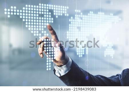 Double exposure of man hand working with abstract digital world map hologram on blurred office background, big data and blockchain concept