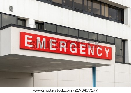 Emergency sign above the entrance at a hospital in the United States.  