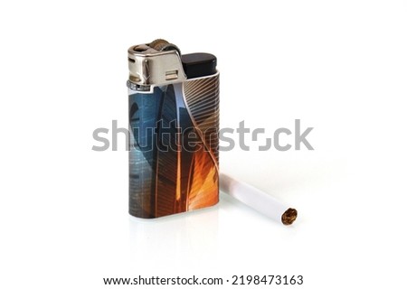 Lighter with cigarette isolated on white close-up