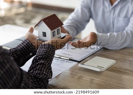 Real estate inheritance concept and contract agreement. The customer makes a rental contract with the landlord. Royalty-Free Stock Photo #2198491609