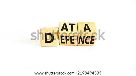 Data defence symbol. Concept words Data defence on wooden cubes. Beautiful white table white background. Business and cyber crime concept. Copy space.