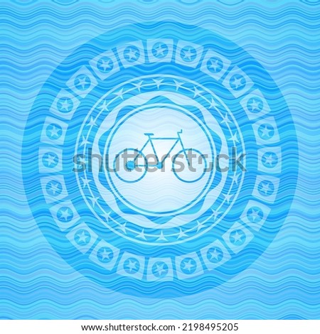 bike icon inside light blue water emblem background. 