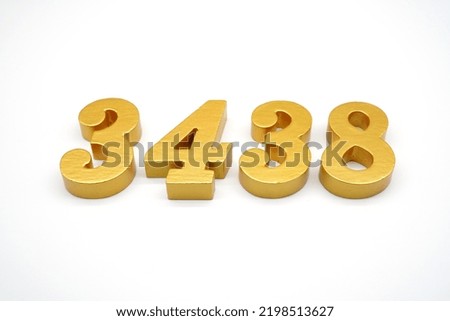    Number 3438 is made of gold-painted teak, 1 centimeter thick, placed on a white background to visualize it in 3D.                                 