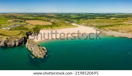 Panoramic aerial view of a beautiful sandy beach and rocky coastline (Broad Haven South, Wales) Royalty-Free Stock Photo #2198520695