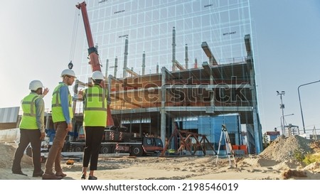 Real Estate Project Construction Site with Architectural Engineer, Investor and Worker Completing Building Development by Using 3D VFX Graphics. Futuristic Concept of Buildings Development Royalty-Free Stock Photo #2198546019