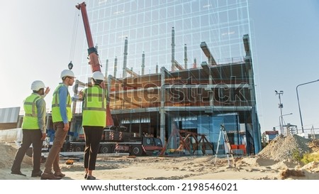 Real Estate Project Construction Site with Architectural Engineer, Investor and Worker Finish Industrial Building Development by Using 3D VFX Graphics. Futuristic Concept of Buildings Development Royalty-Free Stock Photo #2198546021