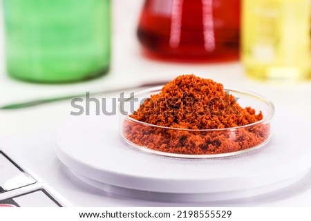 coloring pigments, colored iron oxide, in petri dish, laboratory, precision balance, industrial use Royalty-Free Stock Photo #2198555529