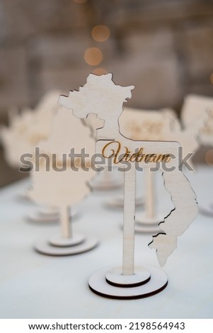 Wood sign for wedding table. Mister and misses signs on wooden chairs for a country style wedding