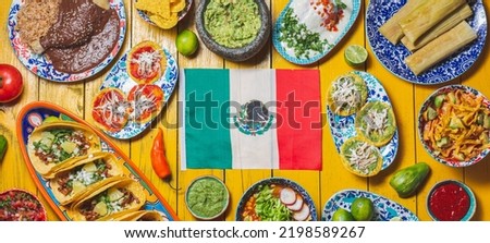 Mexican festive food for independence day independencia - around mexican flag. Top view , Yellow background Royalty-Free Stock Photo #2198589267
