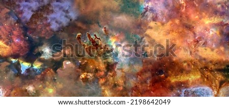 Somewhere in deep space. Pillars of creations and space dust. Science fiction wallpaper. Elements of this image were furnished by NASA.	