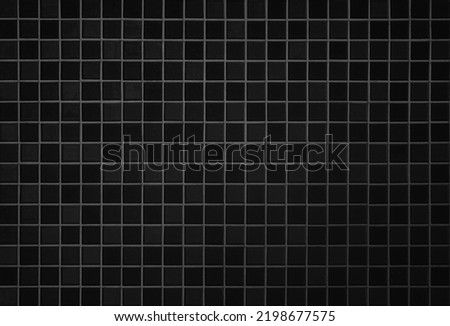 Dark black ceramic wall and floor tiles mosaic background in bathroom and kitchen. Design pattern geometric with grid wallpaper texture decoration pool. Simple seamless abstract surface grunge.