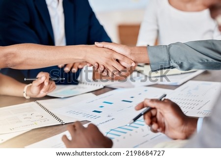 Handshake, partnership and b2b deal with data analyst team discussing documents and infographics at a tablet. Welcome, thank you or agreement of corporate staff shaking hands for teamwork and support Royalty-Free Stock Photo #2198684727