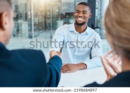 Shaking hands, interview and business people give a handshake after hiring a new company employee. Onboarding, thank you and management welcome young African worker a job promotion in office meeting Royalty-Free Stock Photo #2198684897