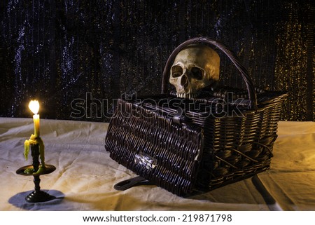 Still life, Skull On The Basket with light of candle