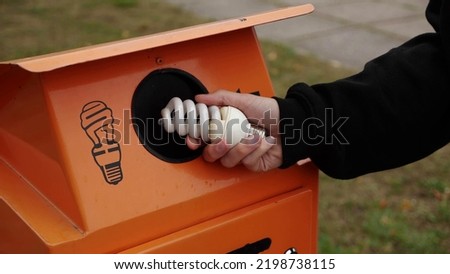 Fluorescent and CFL bulb recycle. Recycling center. Household hazardous waste Royalty-Free Stock Photo #2198738115