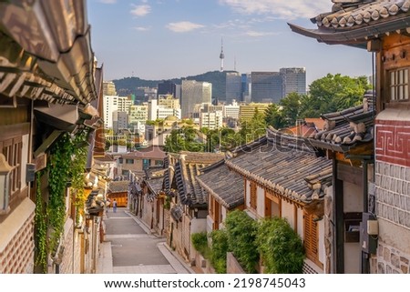 Bukchon Hanok Village with Seoul city skyline, cityscape of South Korea  Royalty-Free Stock Photo #2198745043