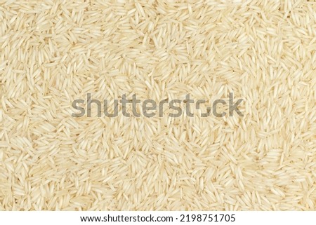 Long grain rice. Top view, full frame photo.