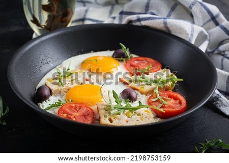 Fried egg, meatloaf, and tomatoes. Keto, paleo breakfast.