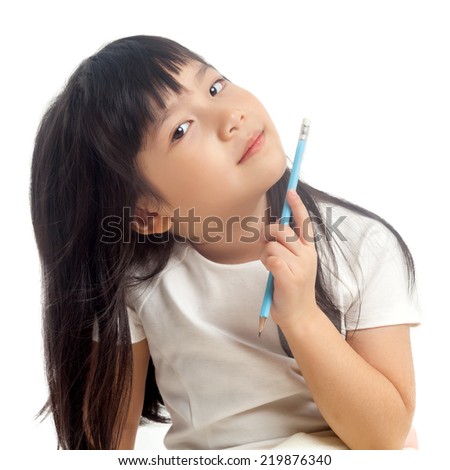 Asian child holding pencil on white background
