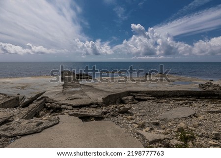 Beautiful coast of the Black Sea. Stone coast. Blue sky with clouds. Beautiful nature. Mountains and sea. Sea beautiful landscape.
