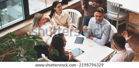 Group of coworkers having coffee break in cafe. Banner design Royalty-Free Stock Photo #2198796329