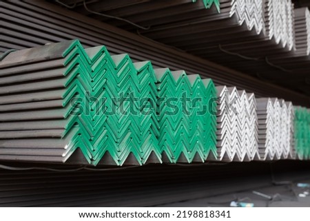 equal angles steel angle iron Metal profile angle in packs at the warehouse of metal products
The arrangement of hot-dip green steel angles on the rack in warehouse Royalty-Free Stock Photo #2198818341