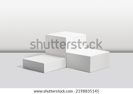 White podiums on white background. Perfect platform for showing your products Royalty-Free Stock Photo #2198835145