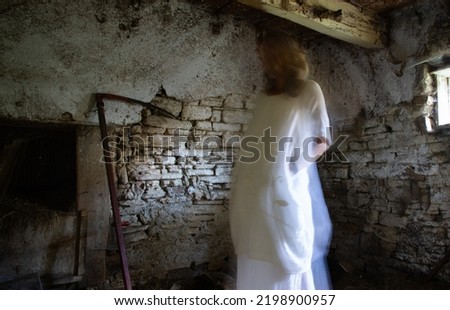 scary ghost in abandoned building at night Halloween background