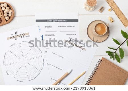 Desktop with life coaching templates and office accessories. Organization, self-development, online coaching concept. Top view, falt lay Royalty-Free Stock Photo #2198913361