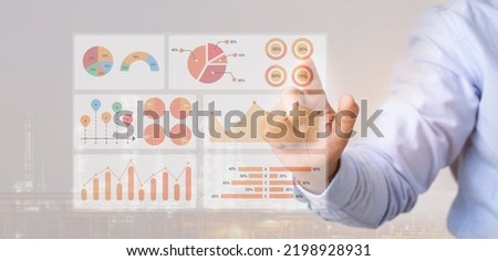 Hand touching graph dashboard show data analysis concept, idea design for business analysis banking and investment growth graph to develop smart financial decision for business plan strategy concept.  Royalty-Free Stock Photo #2198928931