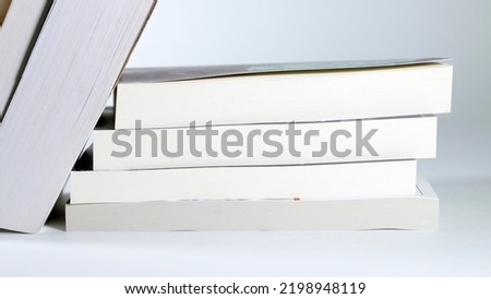 A pile of book with shallow depth of field