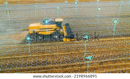 Aerial Shot: Harvester Working on Field. Visualization of the Crops Growing Efficiency with AI Data Analysis Icons. Futuristic Agriculture Concept of Computerized, Eco, Sustainable way of Harvesting