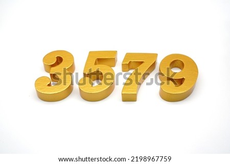    Number 3579 is made of gold-painted teak, 1 centimeter thick, placed on a white background to visualize it in 3D.                               