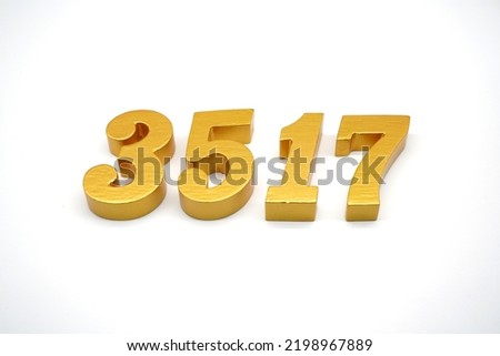  Number 3517 is made of gold-painted teak, 1 centimeter thick, placed on a white background to visualize it in 3D.                                    