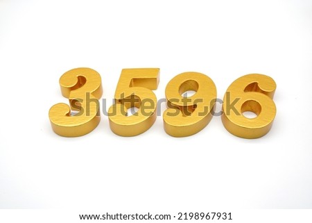   Number 3596 is made of gold-painted teak, 1 centimeter thick, placed on a white background to visualize it in 3D.                              