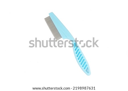 Comb anti flea for dog or cat on white background                              